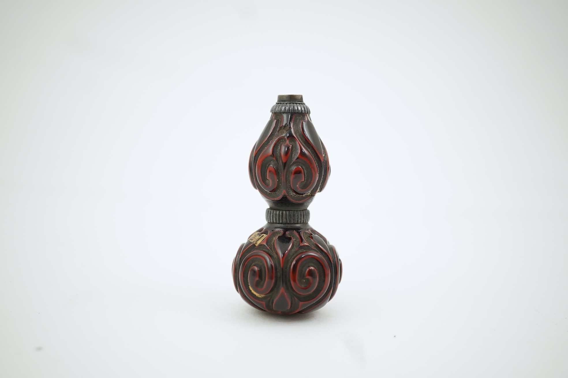 A Japanese guribori lacquer double gourd shaped netsuke, Edo period, late 18th/early 19th century